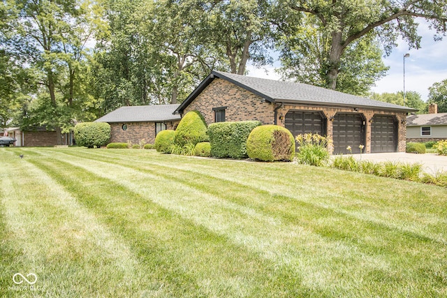 view of property exterior featuring a yard and a garage