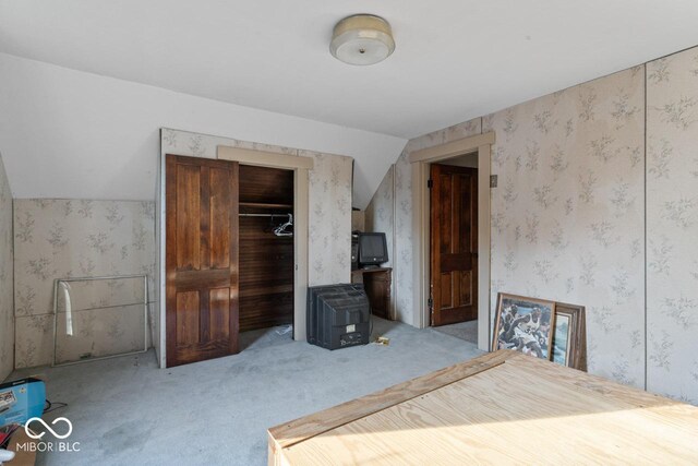 917 S 15th St, New Castle, IN 47362 - carpeted bedroom with wallpapered walls and a closet