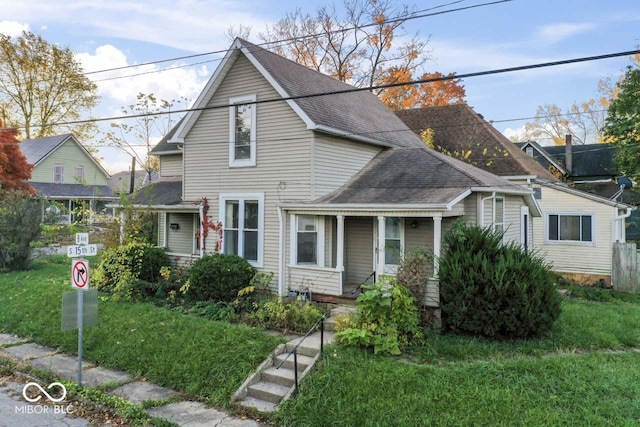 917 S 15th St, New Castle, IN 47362 - view of front facade featuring a porch and a shingled roof