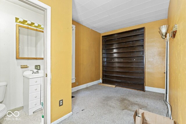 917 S 15th St, New Castle, IN 47362 - unfurnished bedroom featuring carpet and baseboards