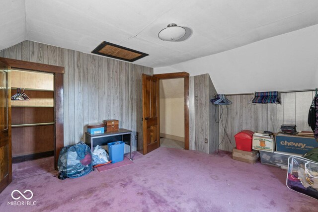 917 S 15th St, New Castle, IN 47362 - additional living space with wooden walls, carpet flooring, and vaulted ceiling