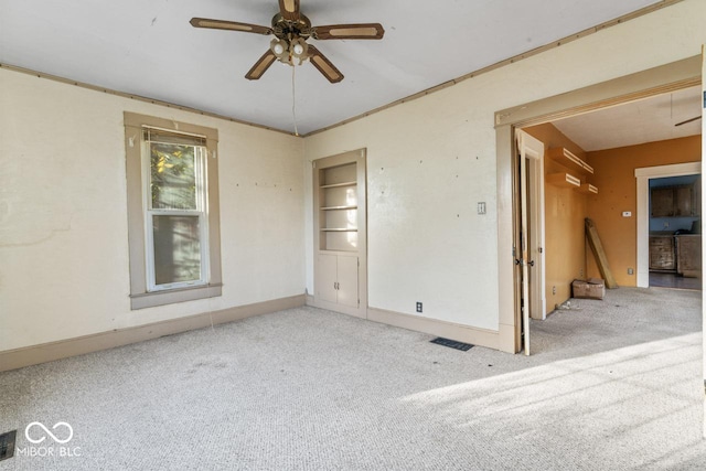917 S 15th St, New Castle, IN 47362 - carpeted empty room featuring baseboards, visible vents, and a ceiling fan