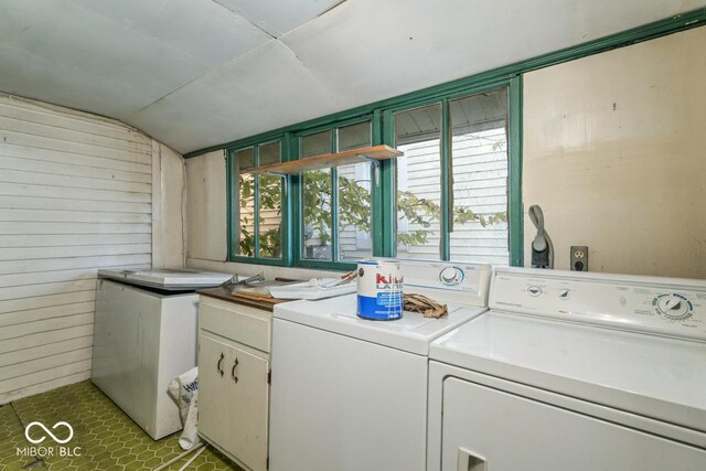 917 S 15th St, New Castle, IN 47362 - clothes washing area with wooden walls, cabinet space, and washing machine and clothes dryer
