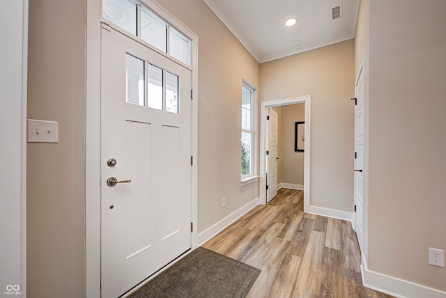 entrance foyer with light hardwood / wood-style flooring