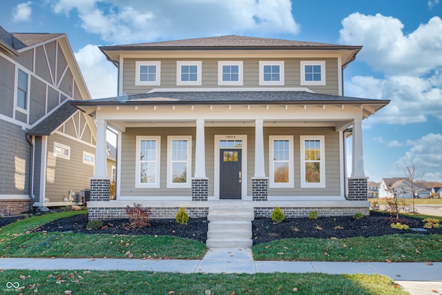 view of front of home featuring covered porch