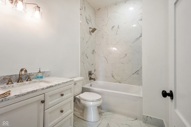 full bathroom featuring vanity, toilet, and tiled shower / bath