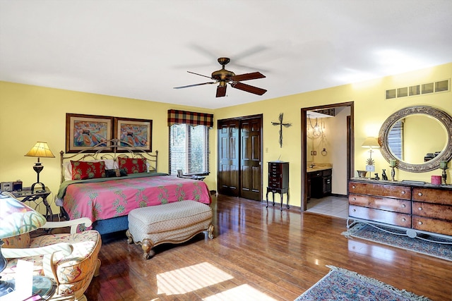 8530 Helmsman Cir, Indianapolis, IN 46256 - bedroom featuring hardwood / wood-style flooring, ensuite bathroom, and ceiling fan