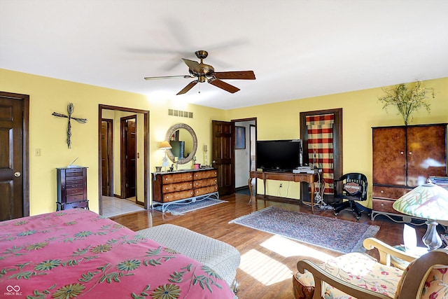 8530 Helmsman Cir, Indianapolis, IN 46256 - bedroom featuring wood finished floors and a ceiling fan