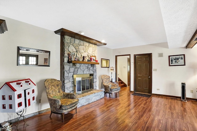 8530 Helmsman Cir, Indianapolis, IN 46256 - living area featuring wood finished floors and a stone fireplace