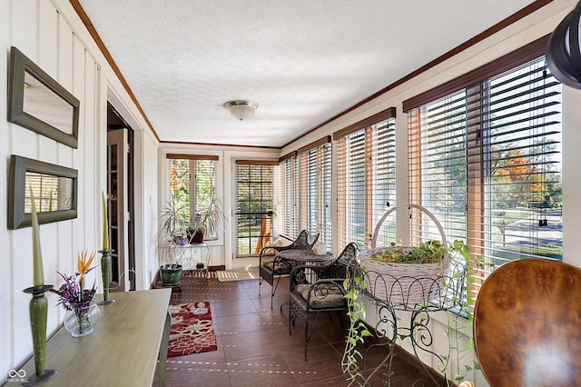 8530 Helmsman Cir, Indianapolis, IN 46256 - sunroom with a textured ceiling, healthy amount of natural light, and crown molding