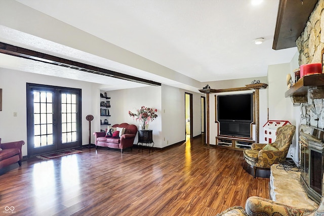 8530 Helmsman Cir, Indianapolis, IN 46256 - living room with wood finished floors, a fireplace, and french doors
