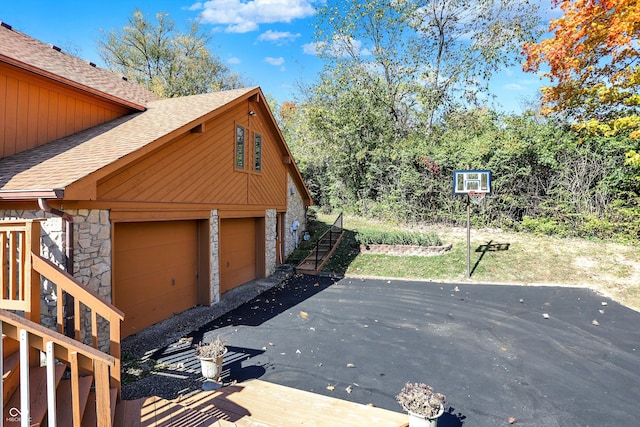 8530 Helmsman Cir, Indianapolis, IN 46256 - garage with asphalt driveway