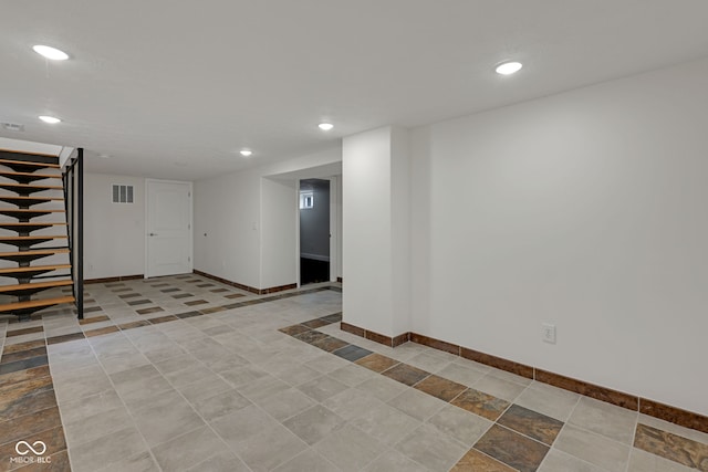 1208 W 18th St, Indianapolis, IN 46202 - finished below grade area with baseboards, recessed lighting, and stairs