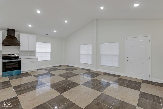 kitchen featuring custom exhaust hood, white cabinets, high vaulted ceiling, and electric stove