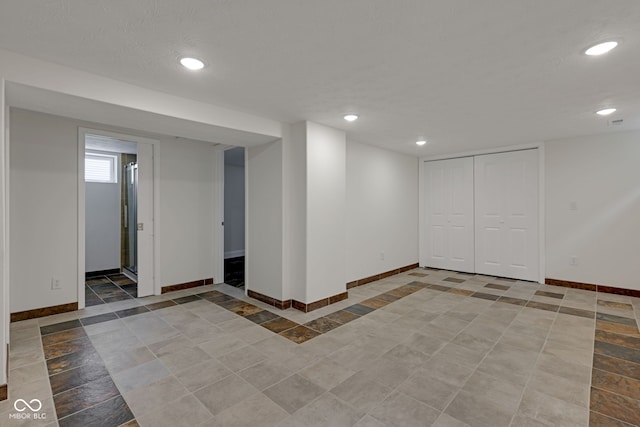 1208 W 18th St, Indianapolis, IN 46202 - basement featuring baseboards and recessed lighting
