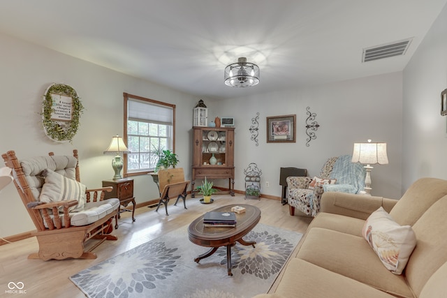 living room with light hardwood / wood-style floors