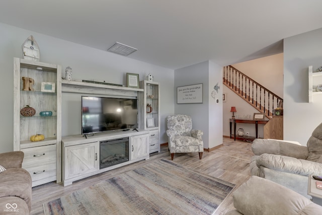 living room with light wood-type flooring