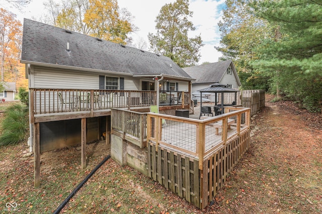 rear view of house with a deck