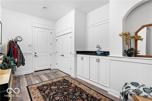 bathroom with hardwood / wood-style flooring