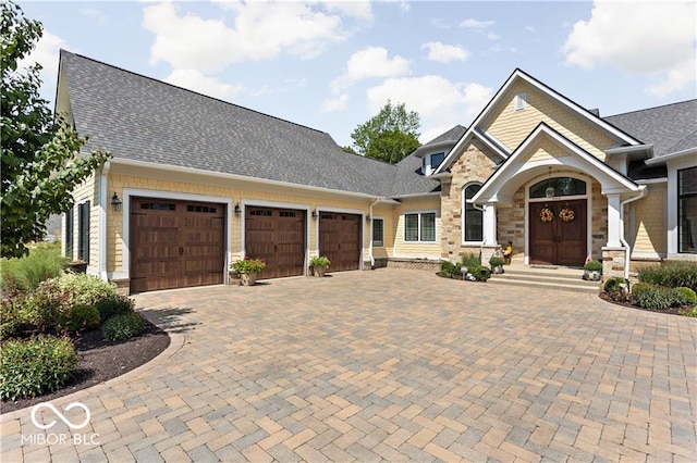 view of front of property featuring a garage