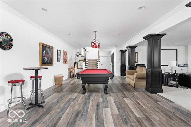 recreation room featuring pool table, crown molding, wood-type flooring, and ornate columns