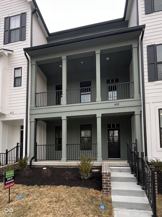 multi unit property featuring a porch