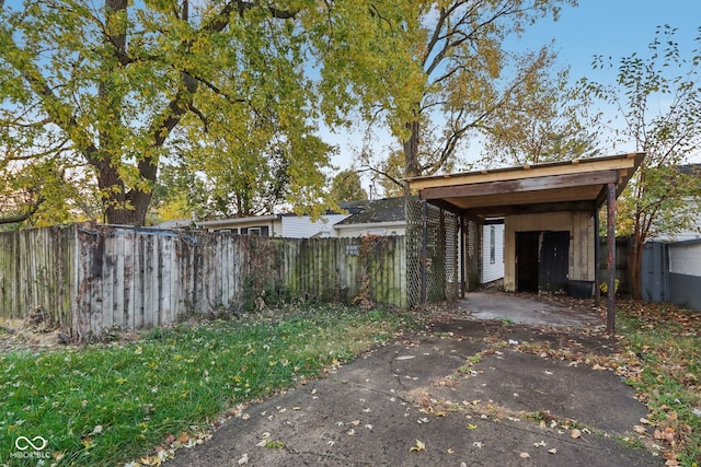 exterior space with a carport