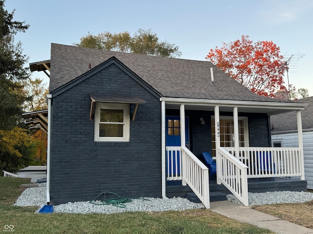 bungalow-style home with a porch