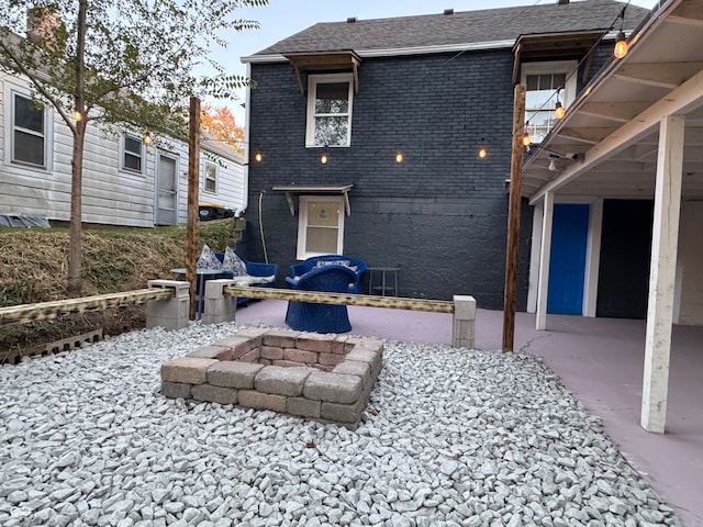 rear view of house with a patio and central air condition unit