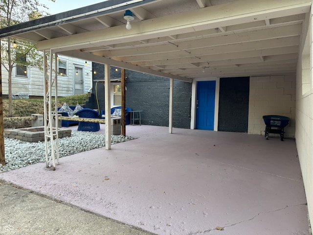 view of patio with a carport