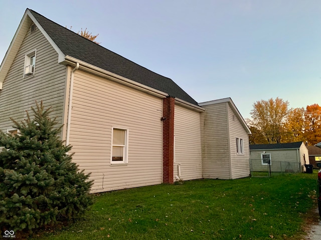 view of home's exterior featuring a lawn