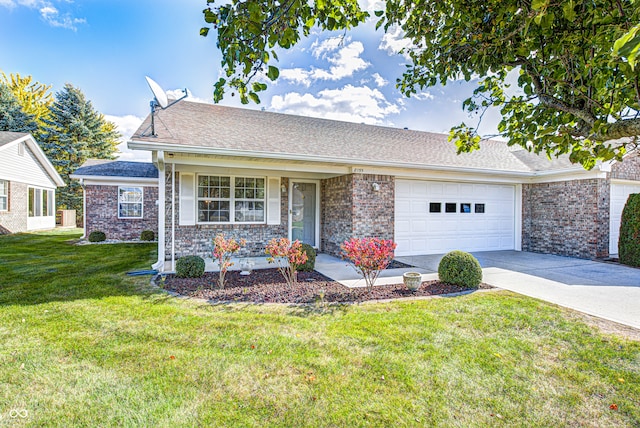 view of front of house with a front lawn and a garage