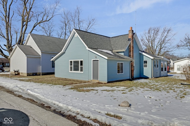 view of snow covered property