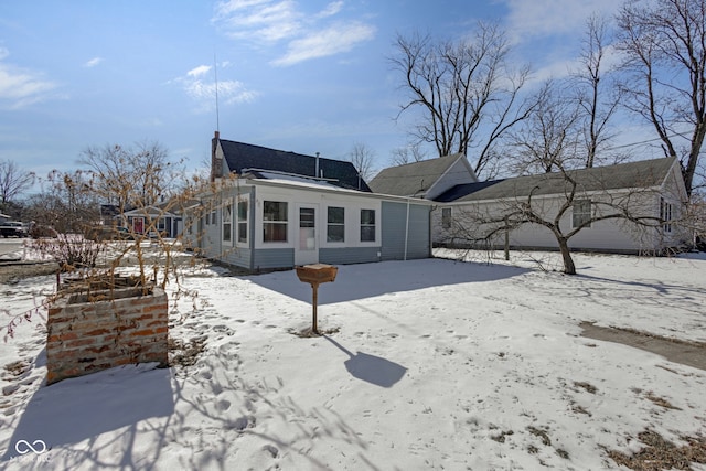 view of snow covered property