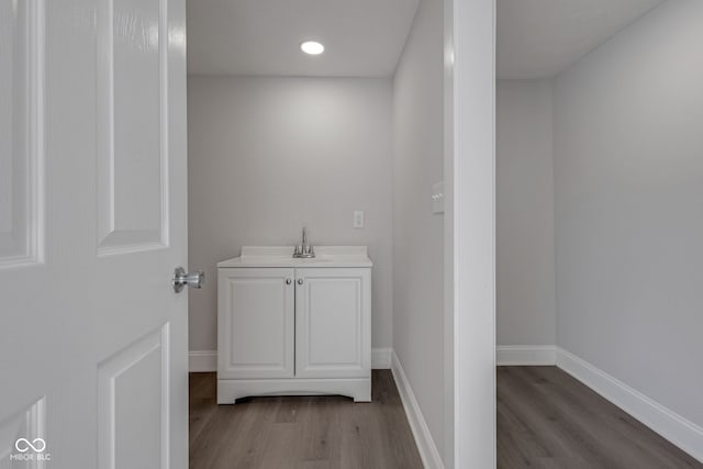 bathroom featuring vanity and hardwood / wood-style floors