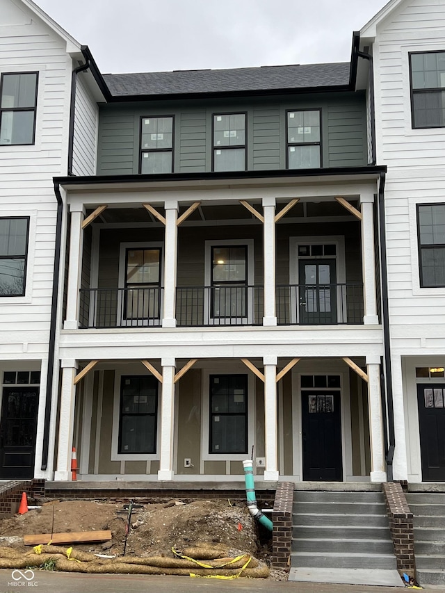 view of property featuring a porch