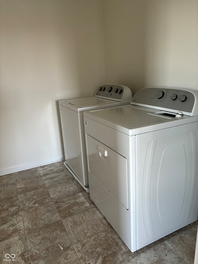 laundry area featuring independent washer and dryer