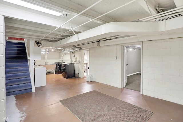 basement with washing machine and dryer