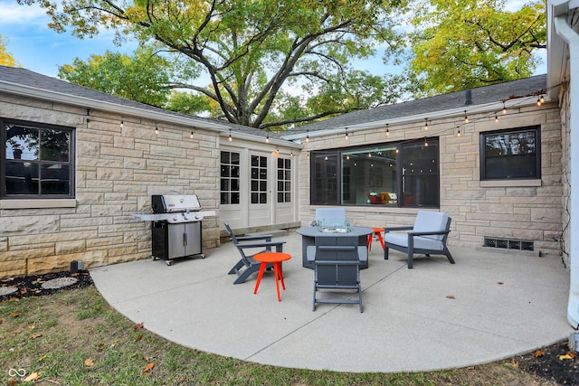 view of patio featuring a grill