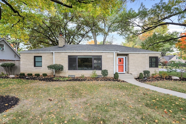 ranch-style house with a front yard