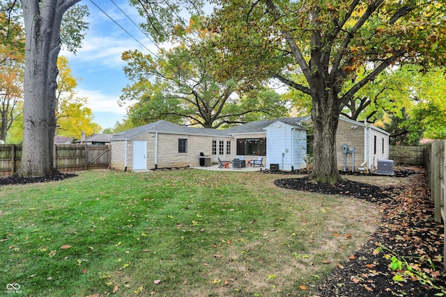 exterior space featuring central AC, a patio, and a storage unit