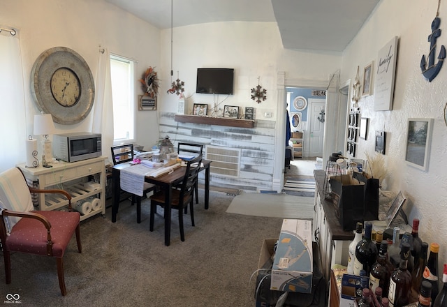 view of carpeted dining area