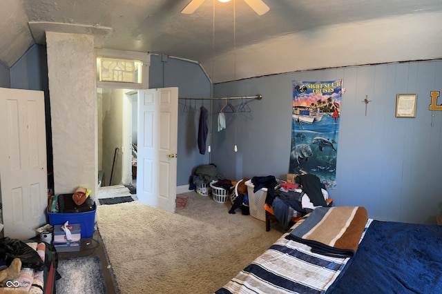 bedroom featuring ceiling fan, carpet, and vaulted ceiling