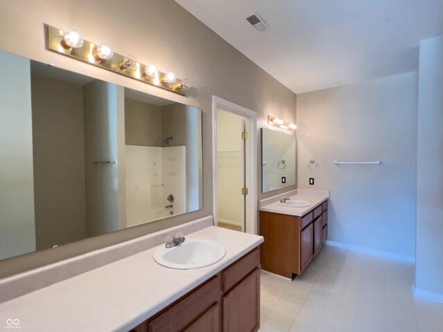 bathroom featuring vanity and walk in shower