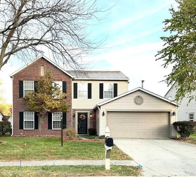 view of front of property featuring a garage and a front lawn