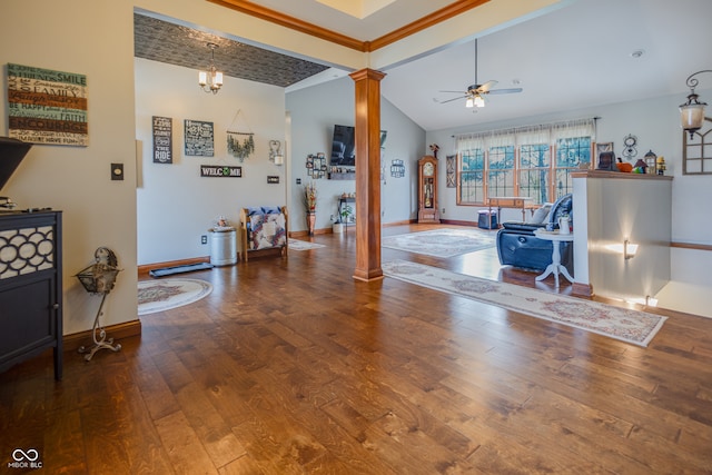 living room with ornamental molding, hardwood / wood-style floors, decorative columns, vaulted ceiling, and ceiling fan