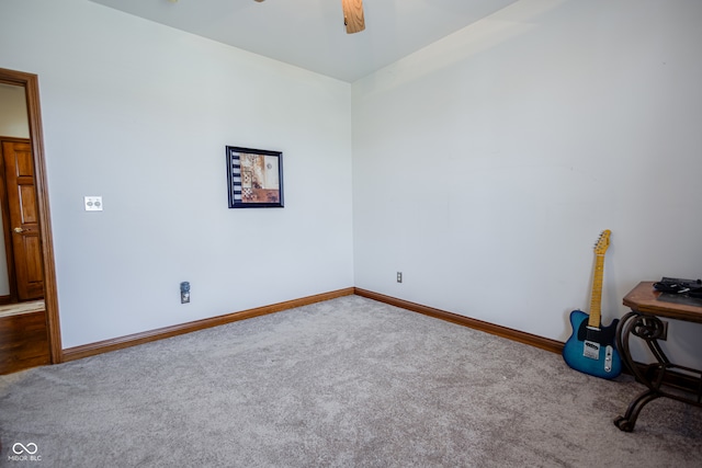 carpeted empty room with ceiling fan