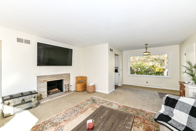 carpeted living room with baseboard heating and a fireplace