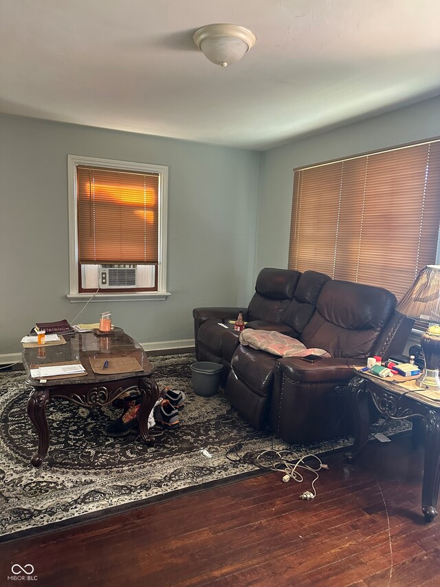 living room featuring dark hardwood / wood-style flooring and cooling unit