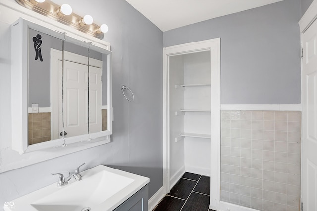 bathroom featuring vanity and tile patterned flooring